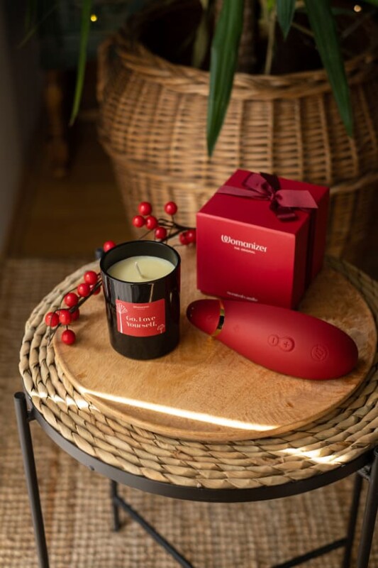 Масажна свічка Womanizer, 155 г, Scented Candle з ароматом білого чаю - Зображення 8