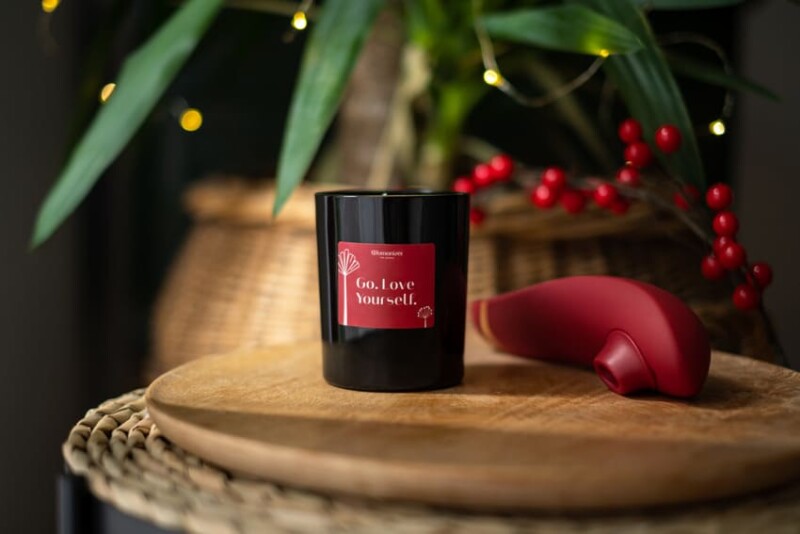 Масажна свічка Womanizer, 155 г, Scented Candle з ароматом білого чаю - Зображення 9